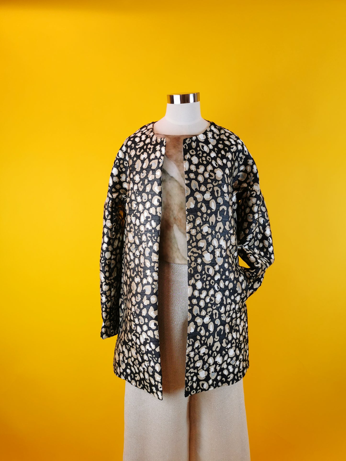 Soprabito tessuto maculato jaquard